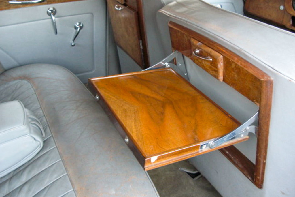The Bentley Bar Car had bar trays on the back of the front seats.