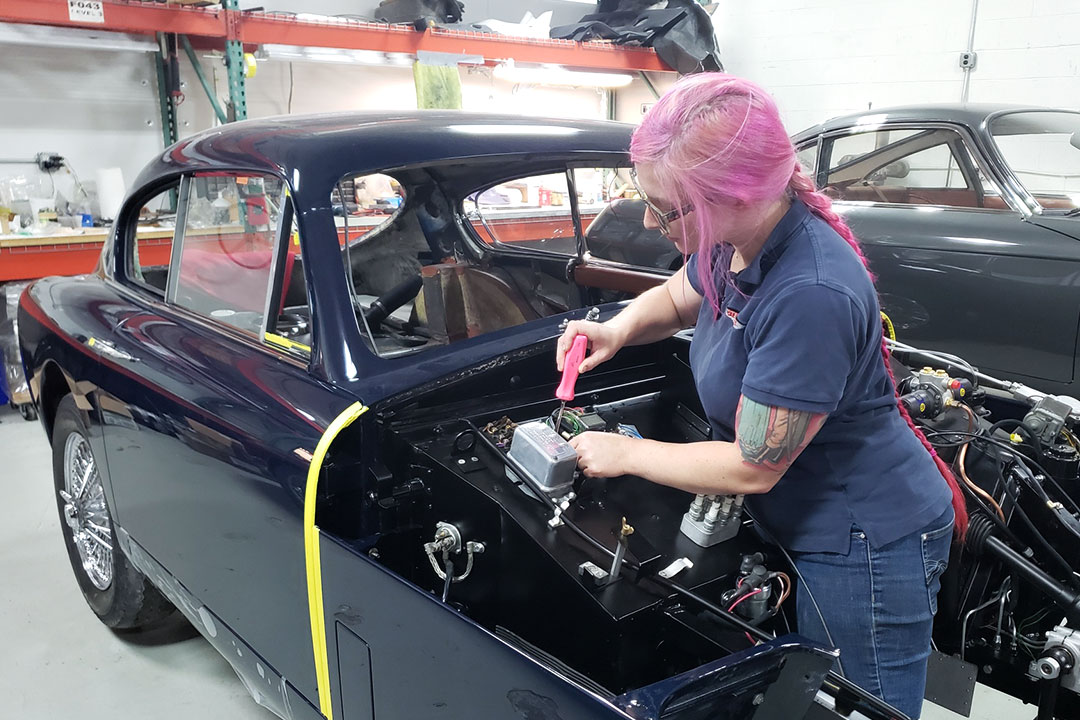 Kira Mundhenk is a auto restoration apprentice at Steel Wings Aston Martin Service.