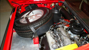 1976 Lancia Scorpion engine bay and spare tire.